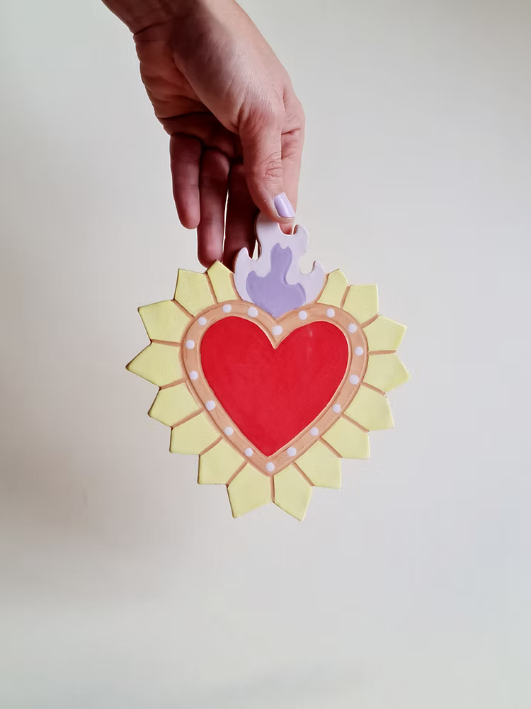 corazón arte mural en ceramica
