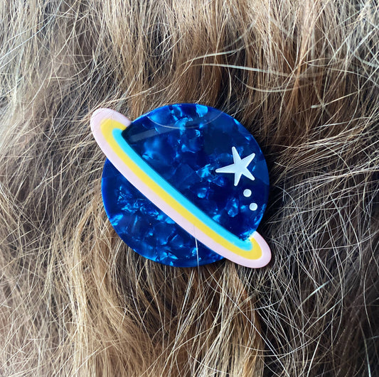 clip de pelo Saturn