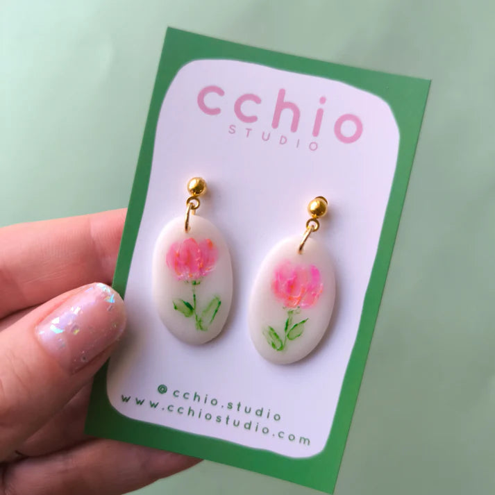 Pendientes pintados a mano ovalado con flor fucsia y naranja