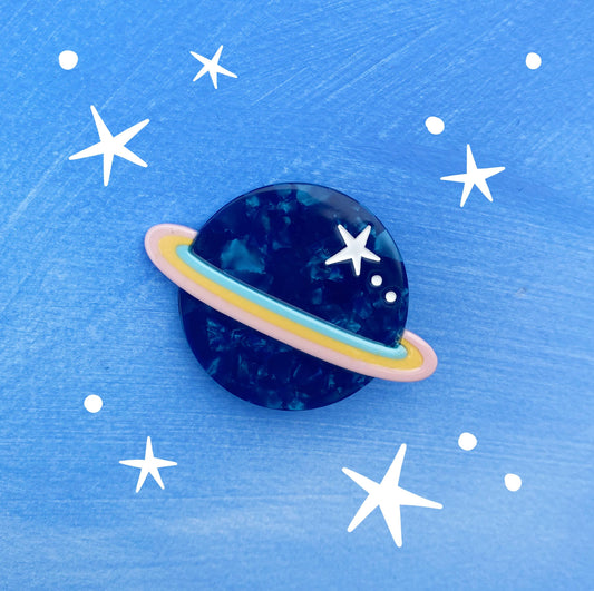 clip de pelo Saturn