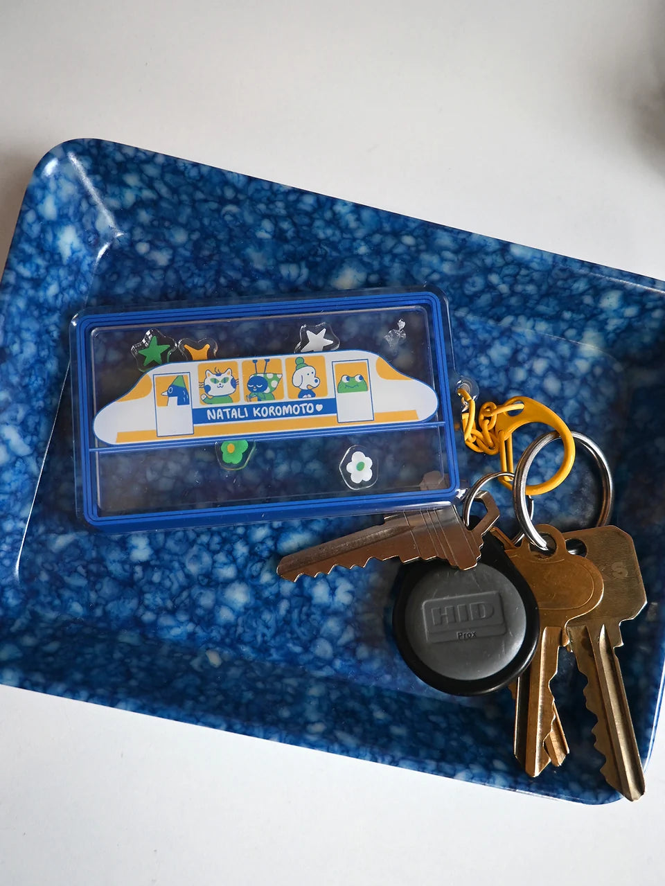 llavero con juego the passengers